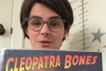 Chloe Smith MP Holding Cleopatra Bones Book